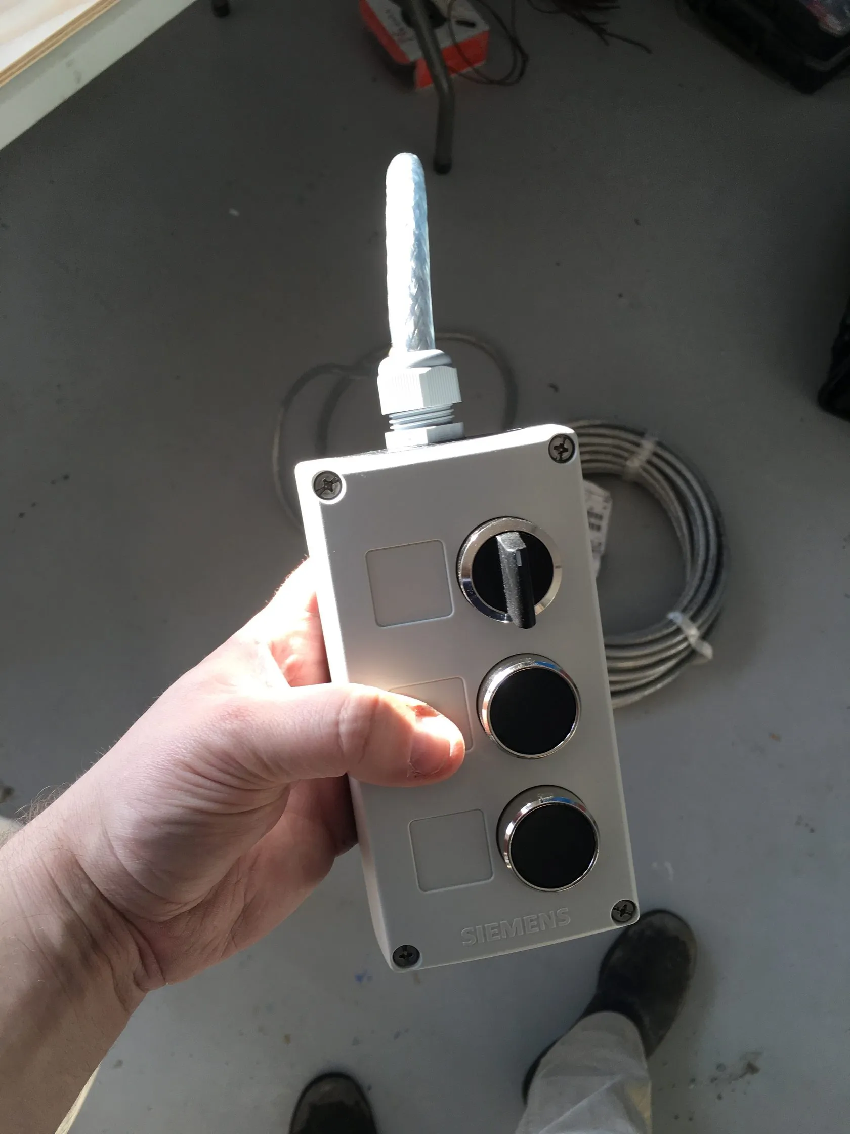 The wired remote for the control cabinet